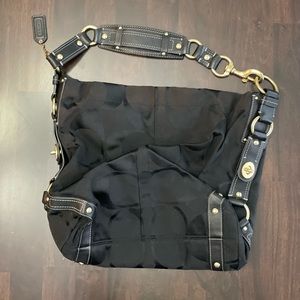 Coach purse / bag.  Black outside with patterns.  Like new…!